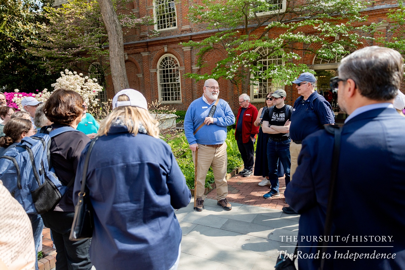 George Boudreau, PhD, leading the Neighborhood Walking Tour; The Pursuit of History—The Road to Independence, Spring 2026 (photo by Joe Tacynec)-302