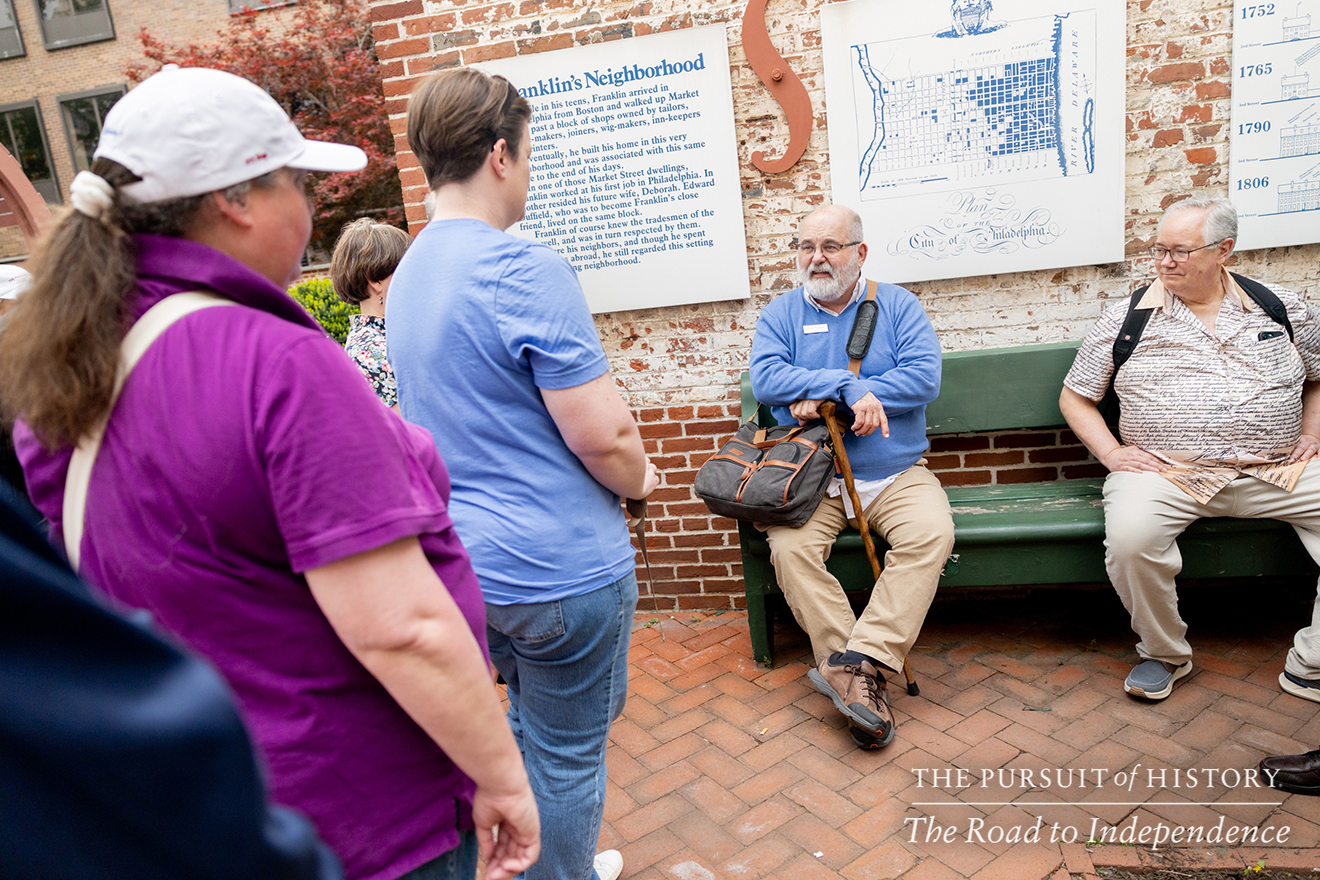 George Boudreau, PhD, leading the Neighborhood Walking Tour; The Pursuit of History—The Road to Independence, Spring 2026 (photo by Joe Tacynec)-337